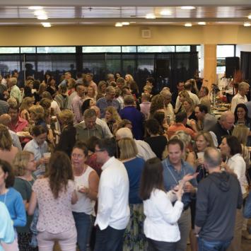 Packed pre-concert reception catered by Pepper's Catering starts the evening festively (Photo by Jim Sabitus)