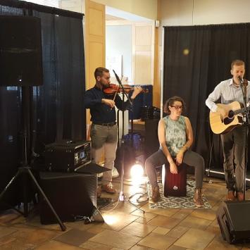 Cory Allen Staats performs at the reception before the Merchant Show (Photo by Stewart Ikeda)