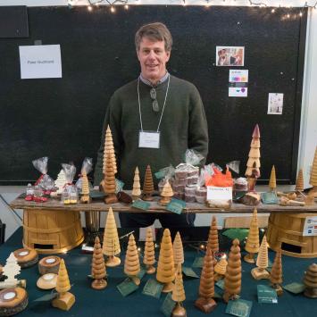 Wood turner selling turned trees
